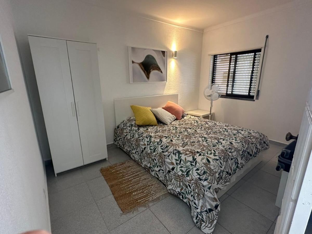 Quarto do Apartamento 1, com cama de casal